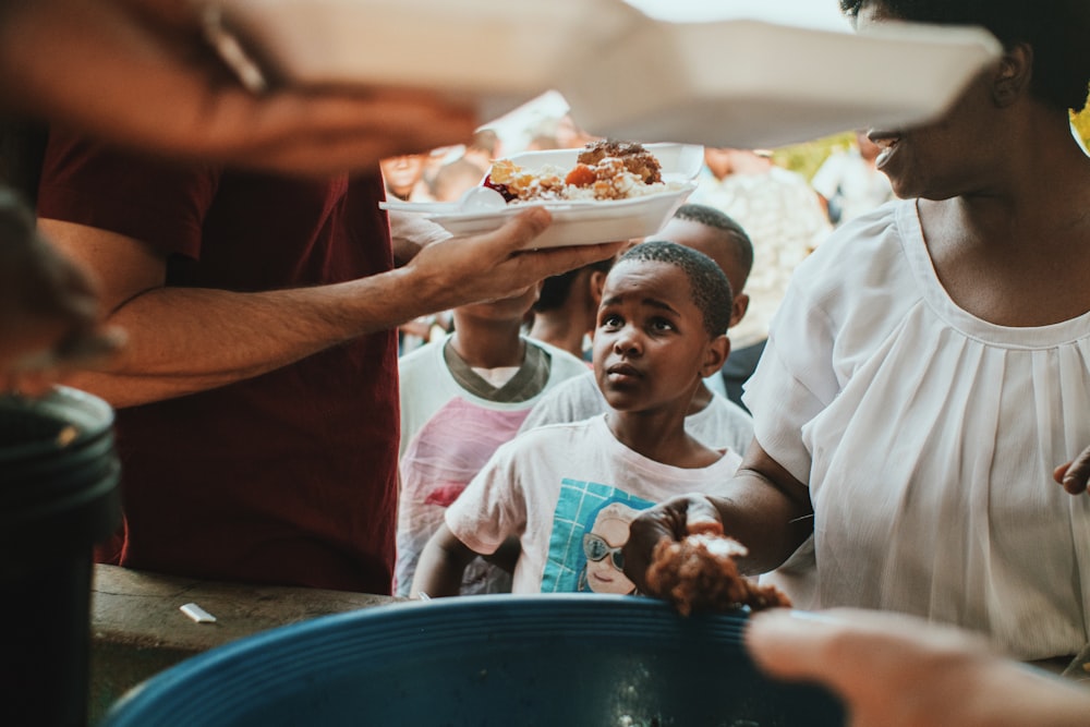 Community members gathered together sharing food and fellowship